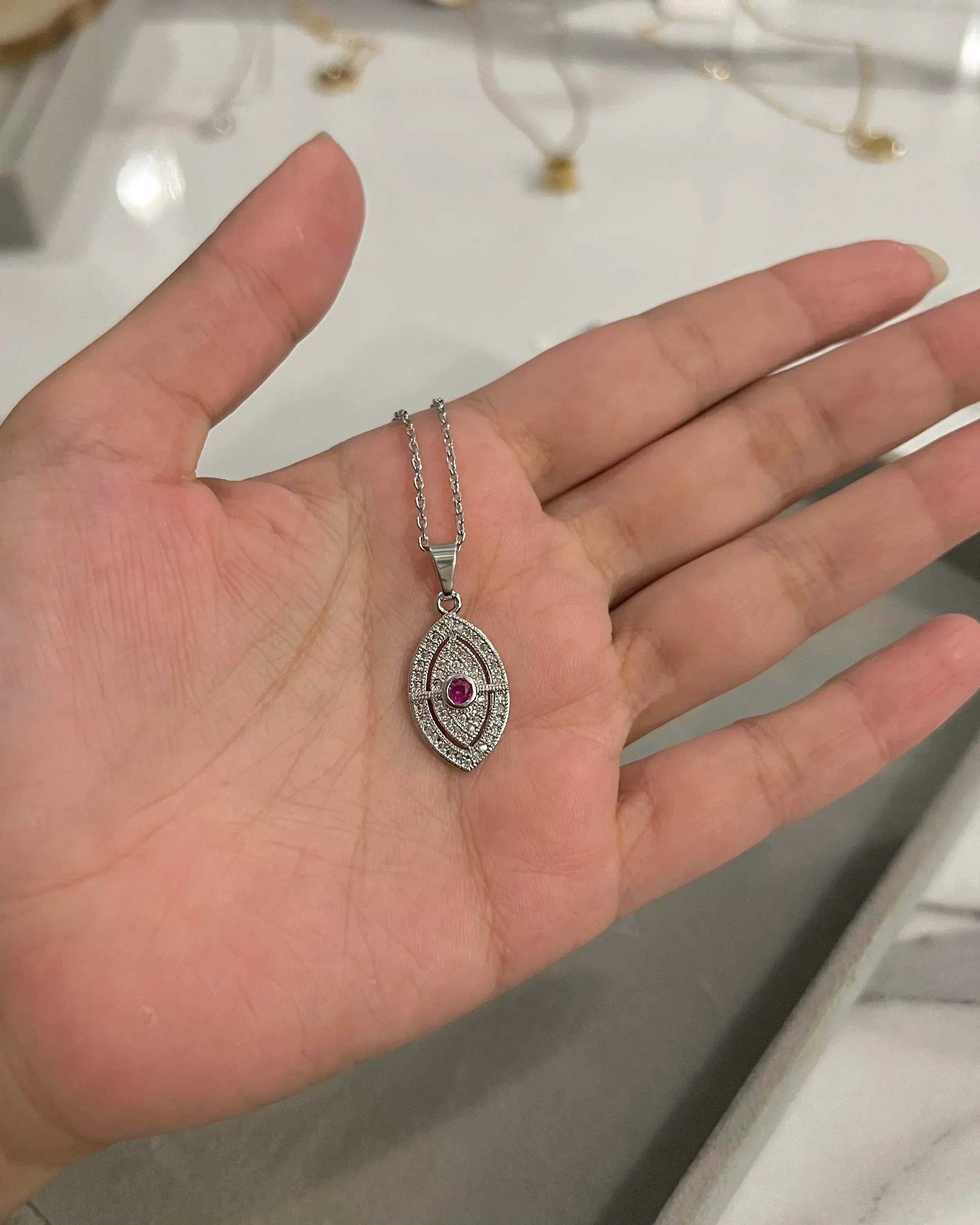 Evil eye silver rhinestone necklace